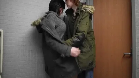 two shemales In Public bathroom giving a kiss And stroking